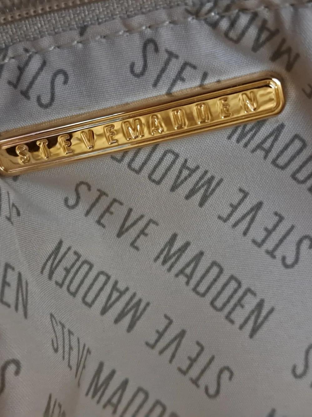 Steve Madden Tan/Brown Logo-Embossed Mini Backpack with Coin Pouch